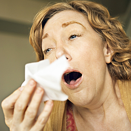 thefix_sneezing woman
