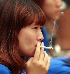 CHINESE-WOMAN-SMOKES
