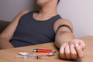 heroin addict passed out