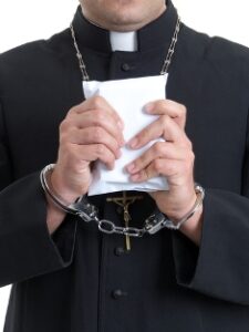 priest in cuffs