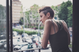 young woman window
