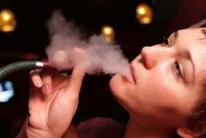 woman smoking hookah