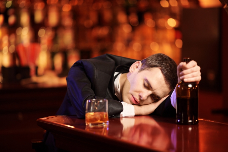 young man passed out bar