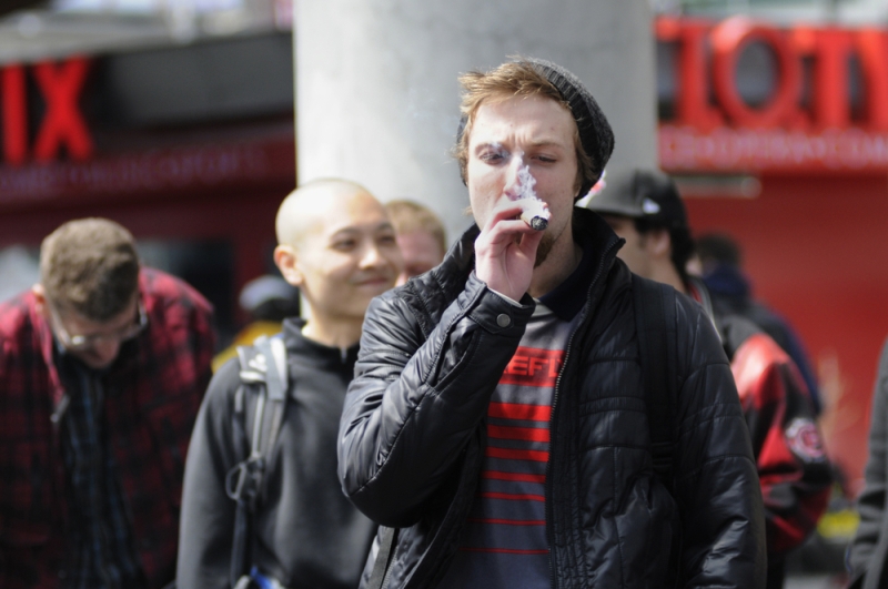 young man smoking fat joint