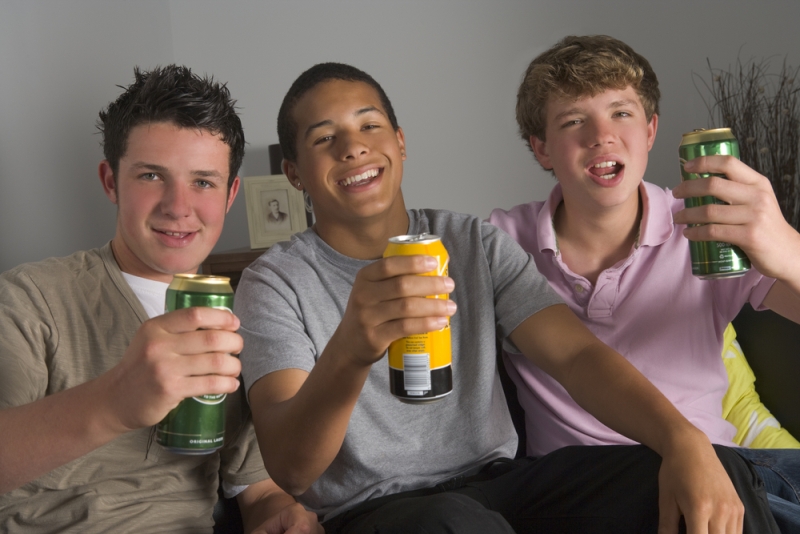 three teens drinking beer