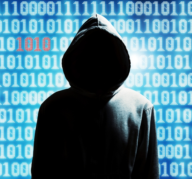 hooded dark web figure