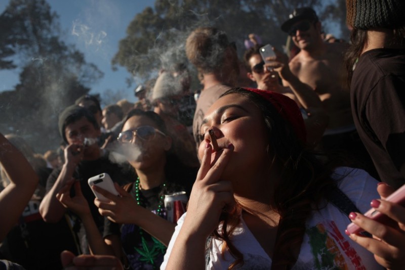 crowd smoking weed