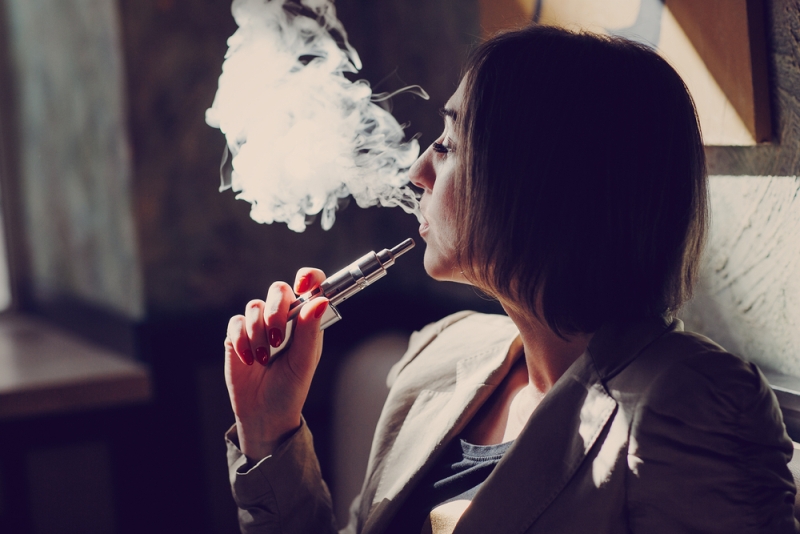 woman smoking ecig