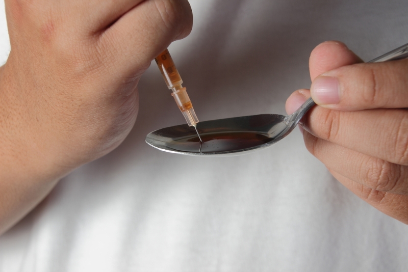 heroin spoon needle