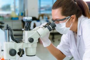 scientist microscope lab