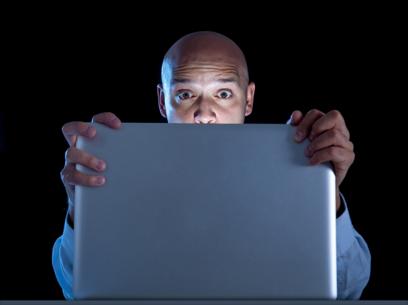 surprised man watching porn