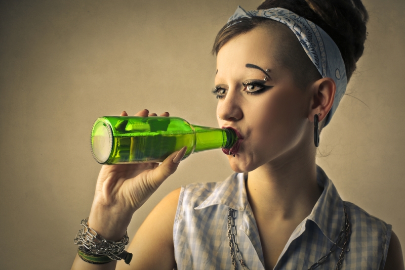 teen girl drinking beer