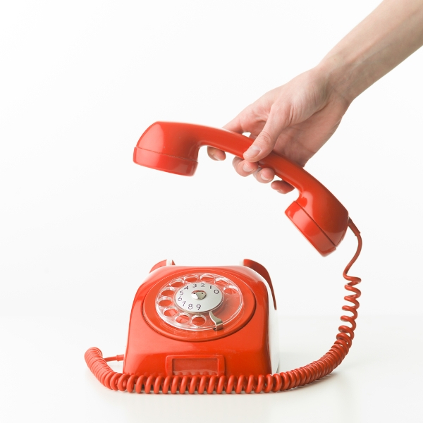 hand picking up phone