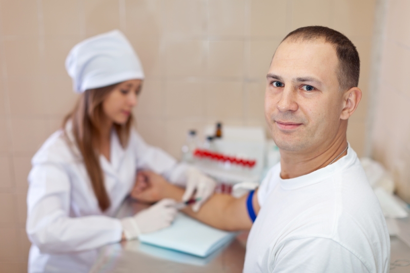 man having blood drawn