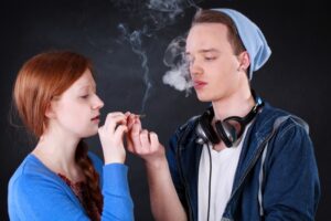 two teens smoking pot