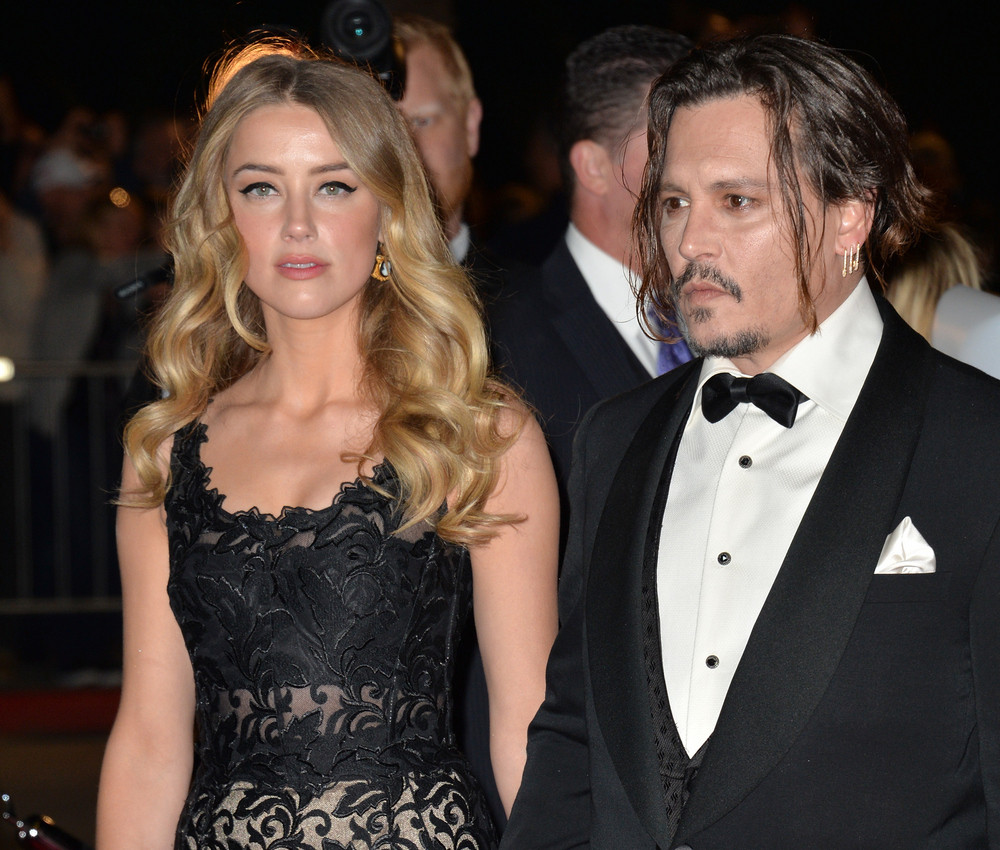 Amber Heard Calls Johnny Depp 'An Alcoholic and Drug Addict' in Court Documents