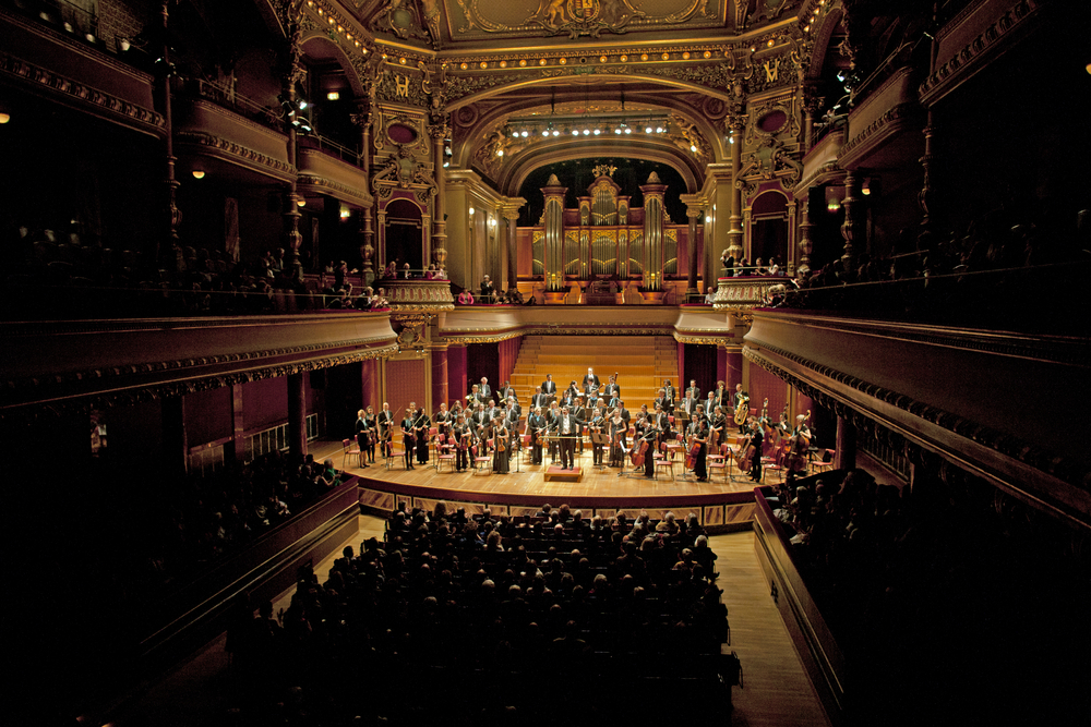 A Swiss orchestra playing for an audience.