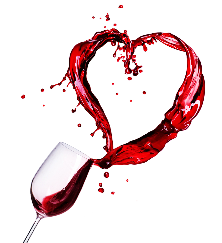 A wine glass spilling into the shape of a heart.