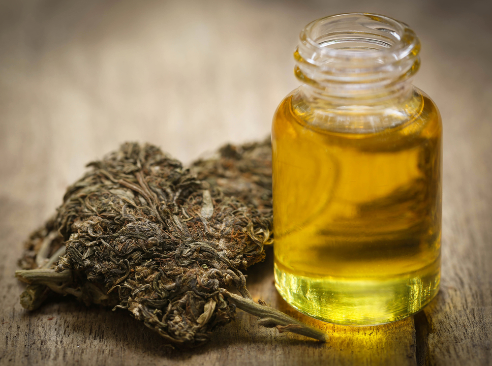 cannabis oil and a nugget of marijuana