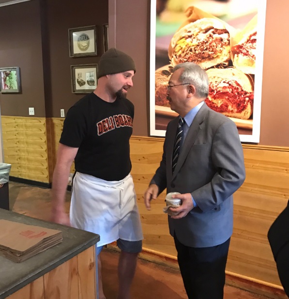 Mayor talks to Deli Owner