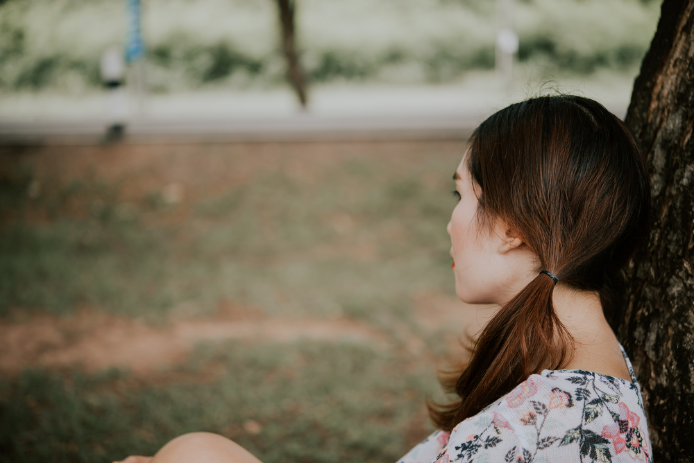 Girl looking away sadly
