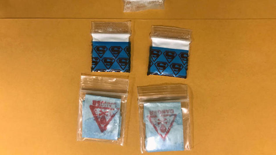 Baggies of heroin marked with a Superman logo and a Danger logo