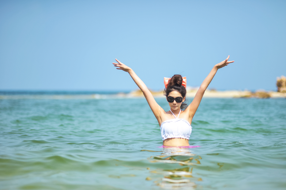 woman in bikini in ocean