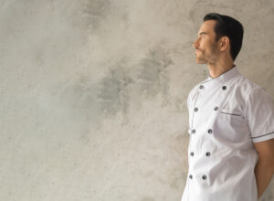Male chef in a white coat
