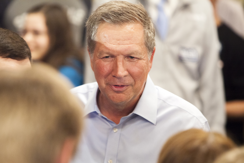 Republican presidential candidate John Kasich speaks to a group of supporters during a town hall before the Wisconsin presidential primary in Madison, Wisconsin.