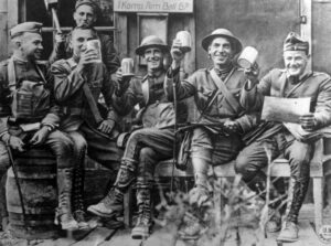 American soldiers holding beer steins