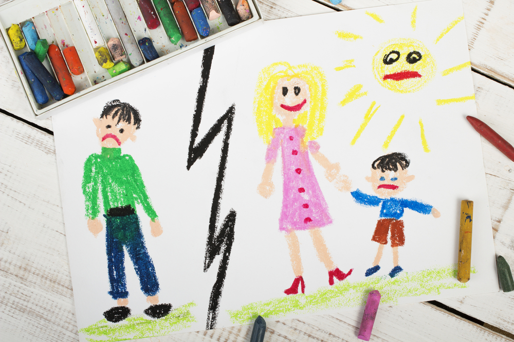 A childish drawn picture showing a man separated from a woman holding the hand of an unhappy child.