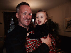 Andrew Michinard and child