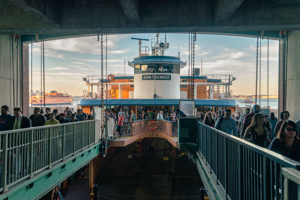 People inside of the Staten Island Ferry station.