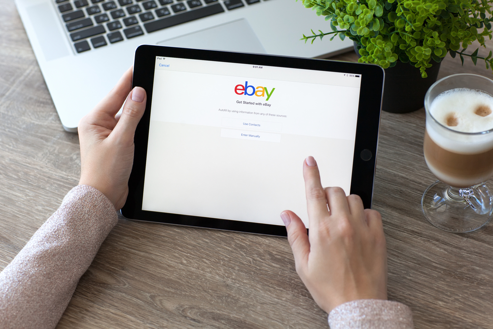 woman using the eBay site on her tablet.