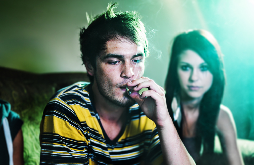 teen smoking at party