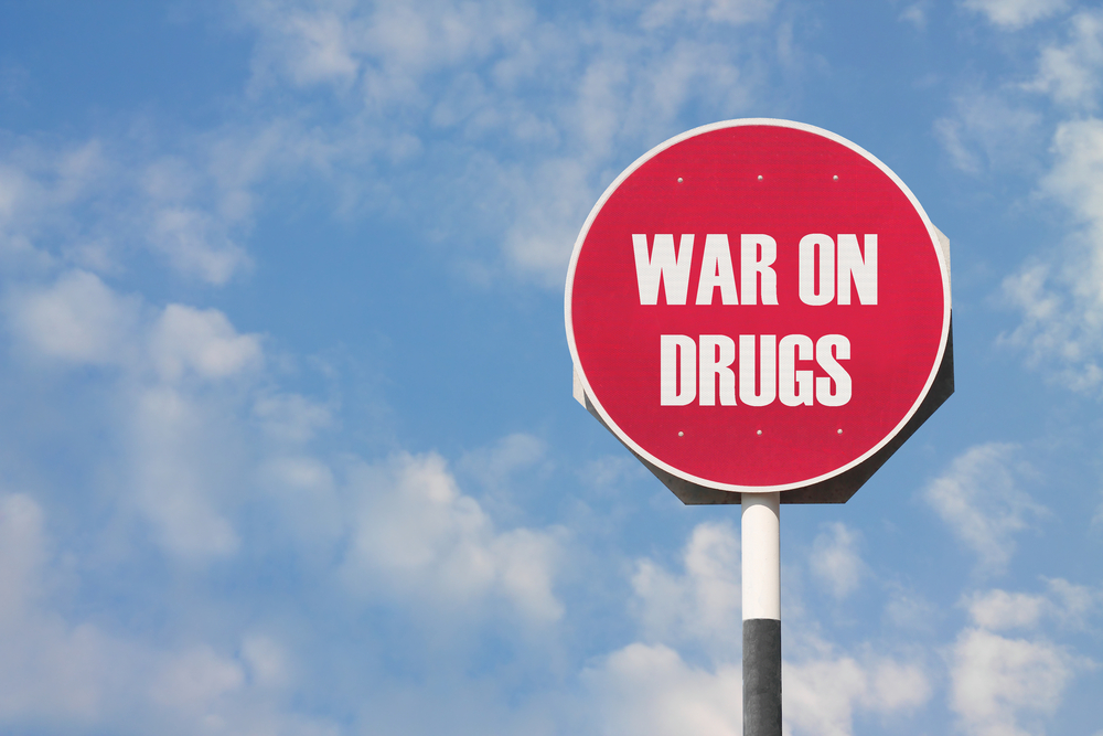 Stop sign with "WAR ON DRUGS" written on it