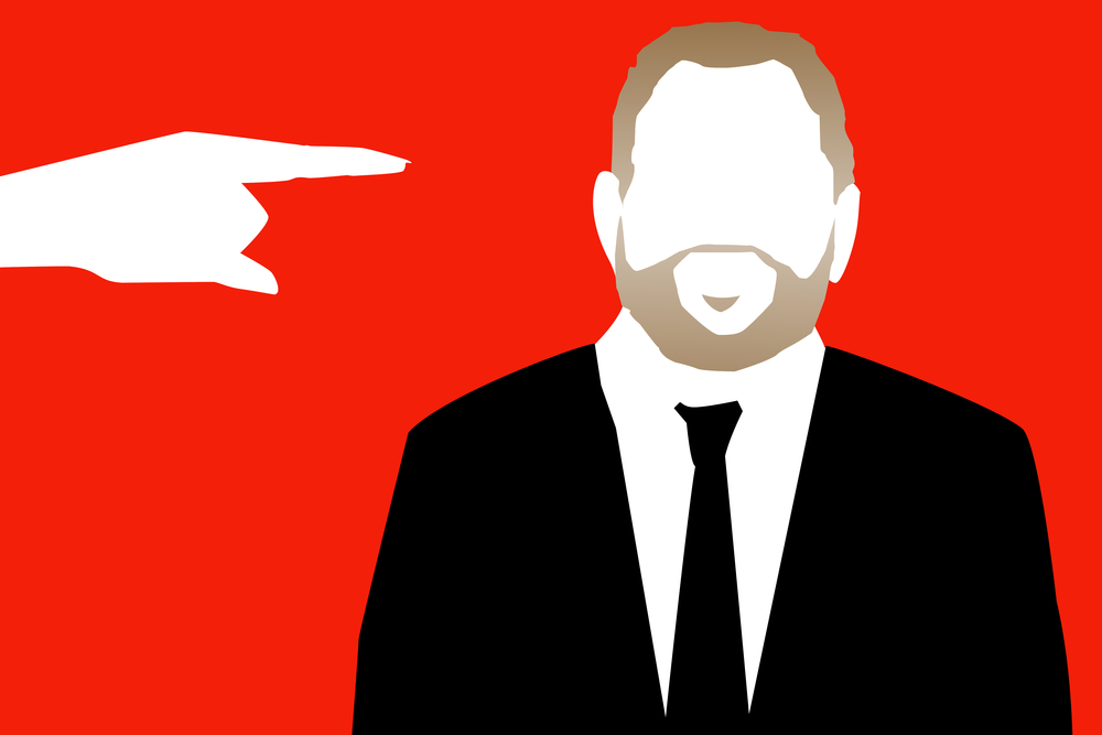 A graphic with a hand pointing at a male figure / Harvey Weinstein