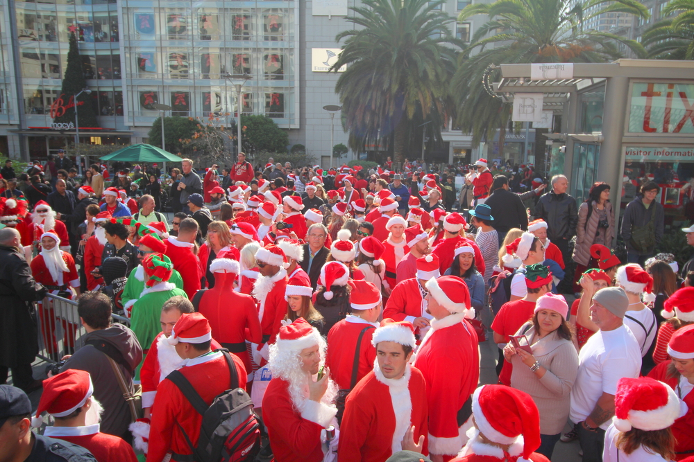 Thousands of people in festive Christmas holiday costumes gather for SantaCon in Union Square in San Francisco for the annual Santarchy event.