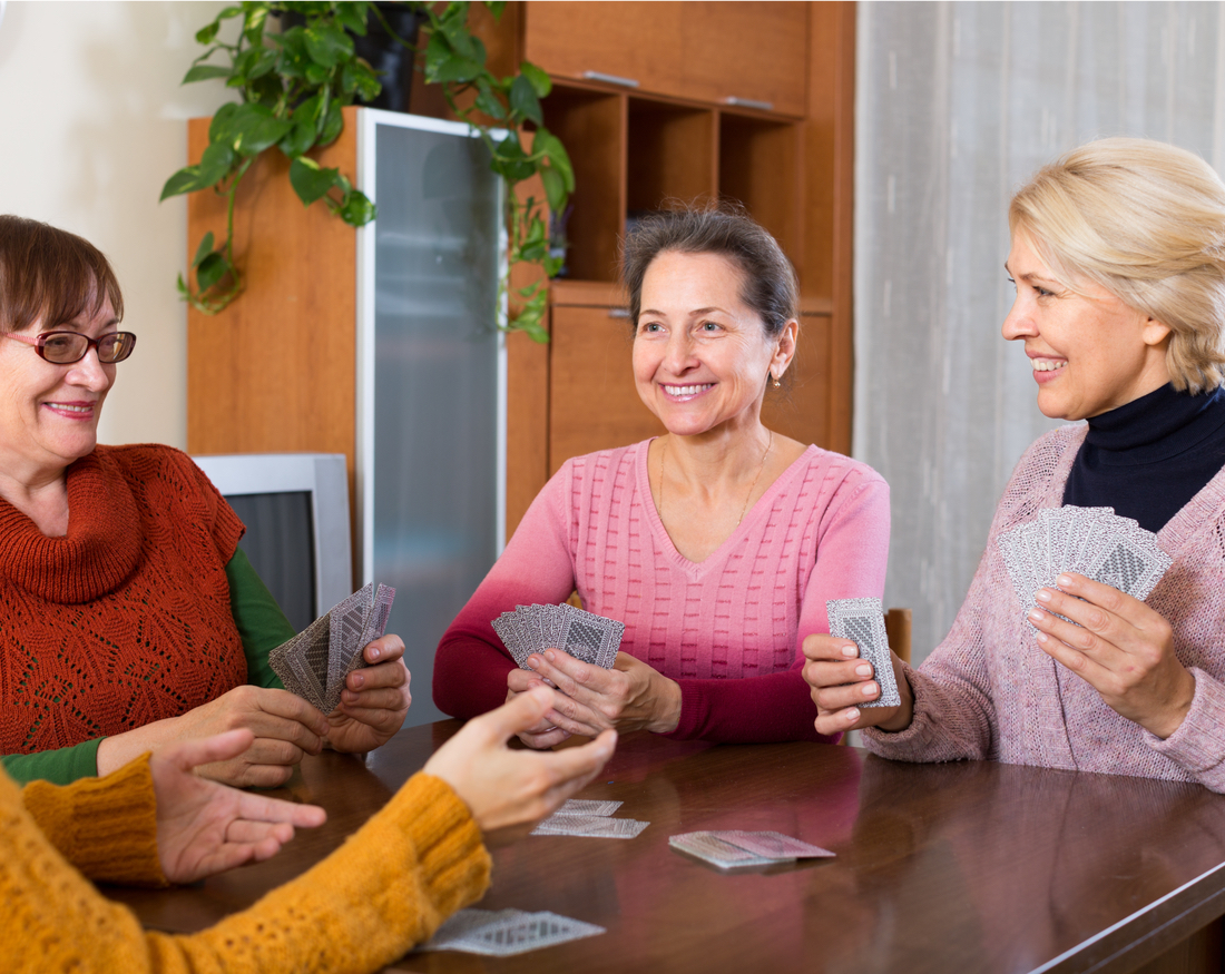 a group of women playing cards