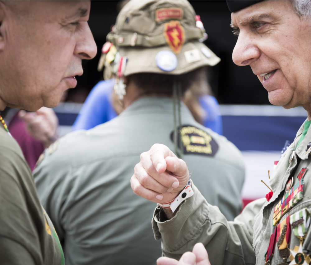 vets in uniform having a conversation