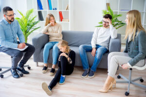 Teenage girl and her family in therapy