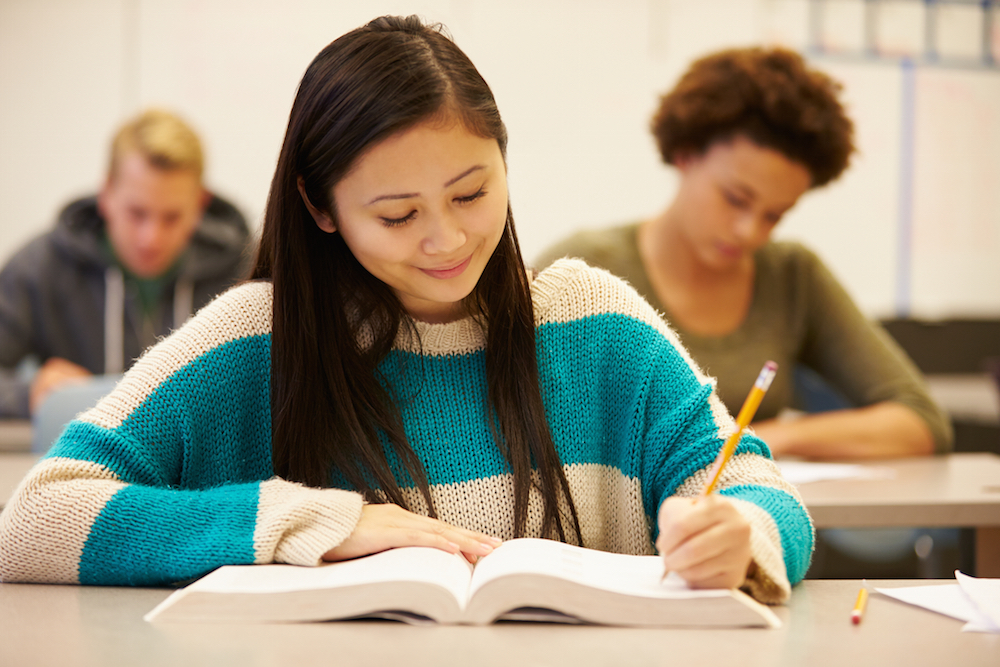High school students learning in a classroom