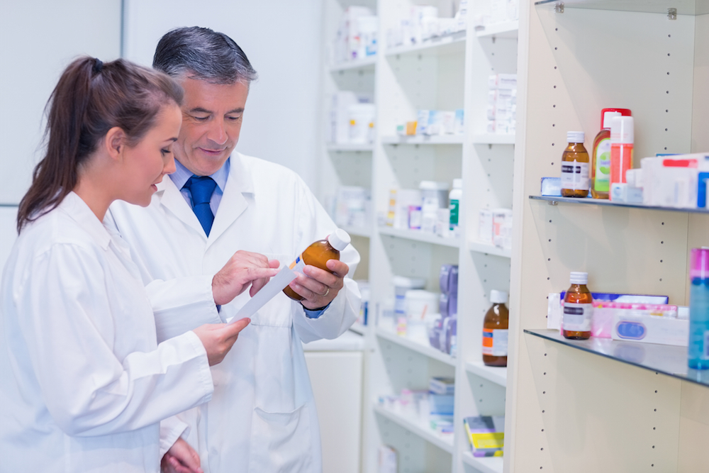 Pharmacists discussing medication