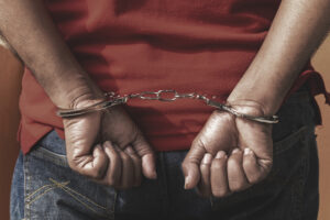 man wearing handcuffs