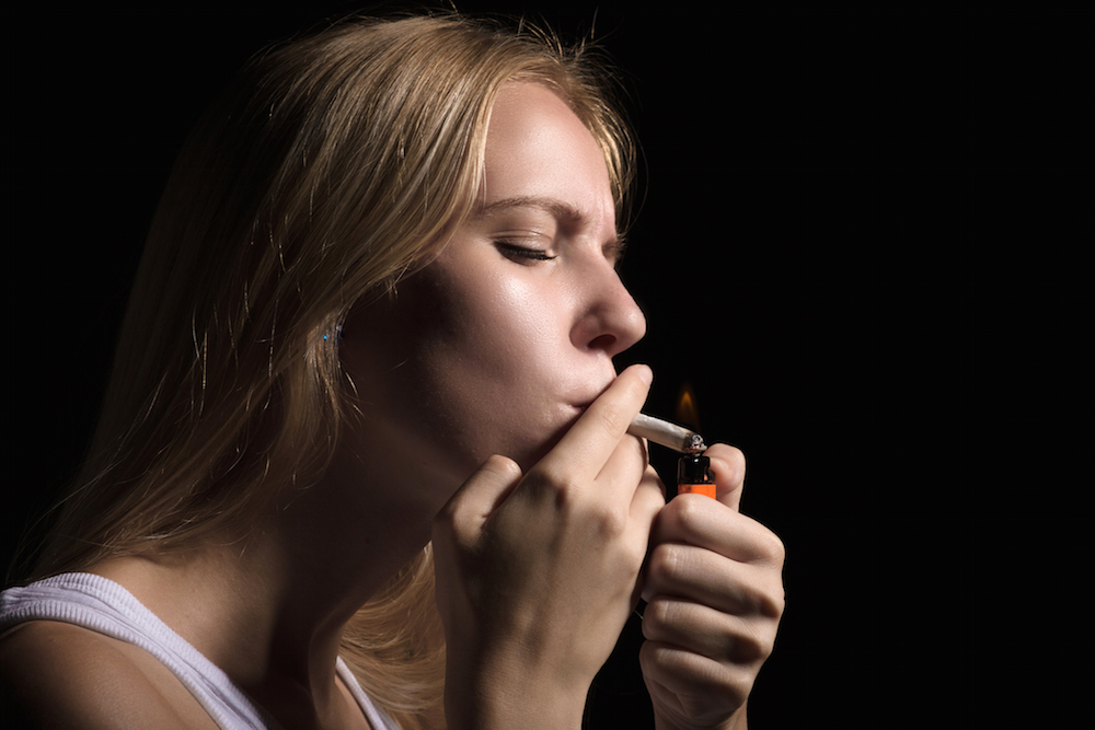 Woman smoking a joint