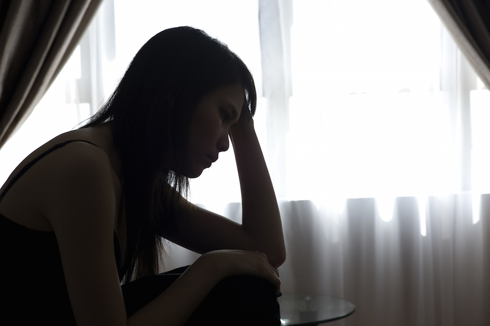a black and white silhouette of a woman