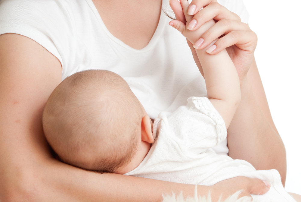 mother holding infant