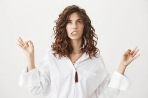 Frazzled woman trying to meditate