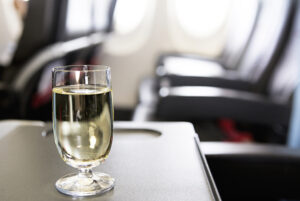 glass of wine on flight