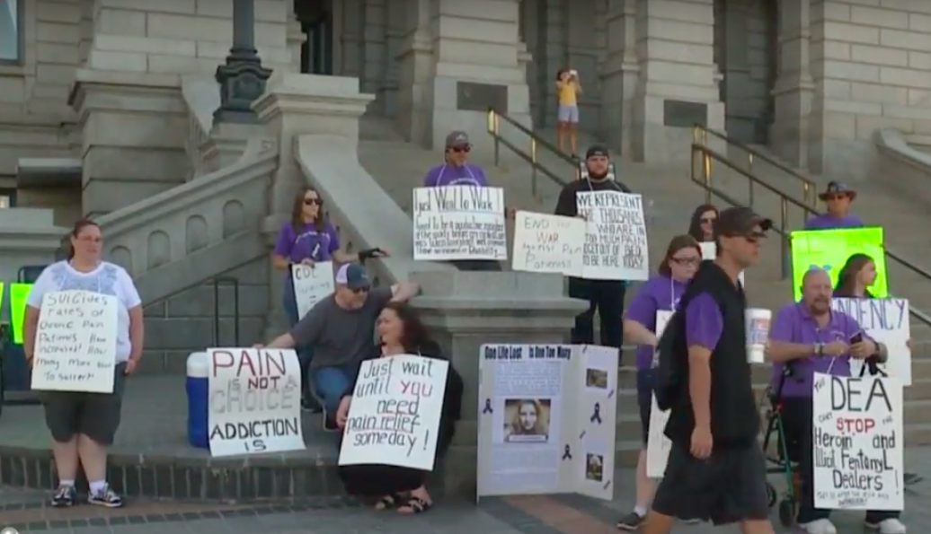 Participants at the Don't Punish Pain rally in Denver